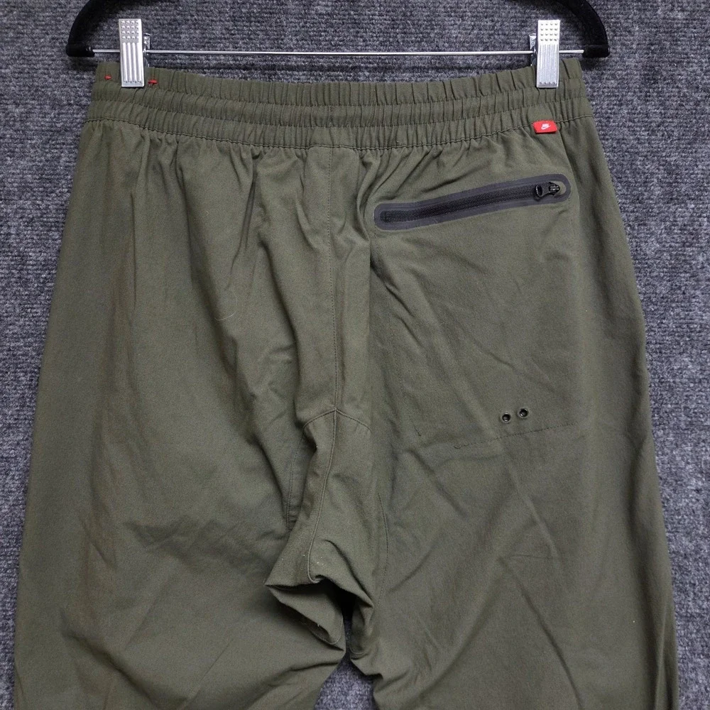 Nike Sportswear V442 Jogger Men Large Green Woven Bonded Tech Nylon Tapered FLAW